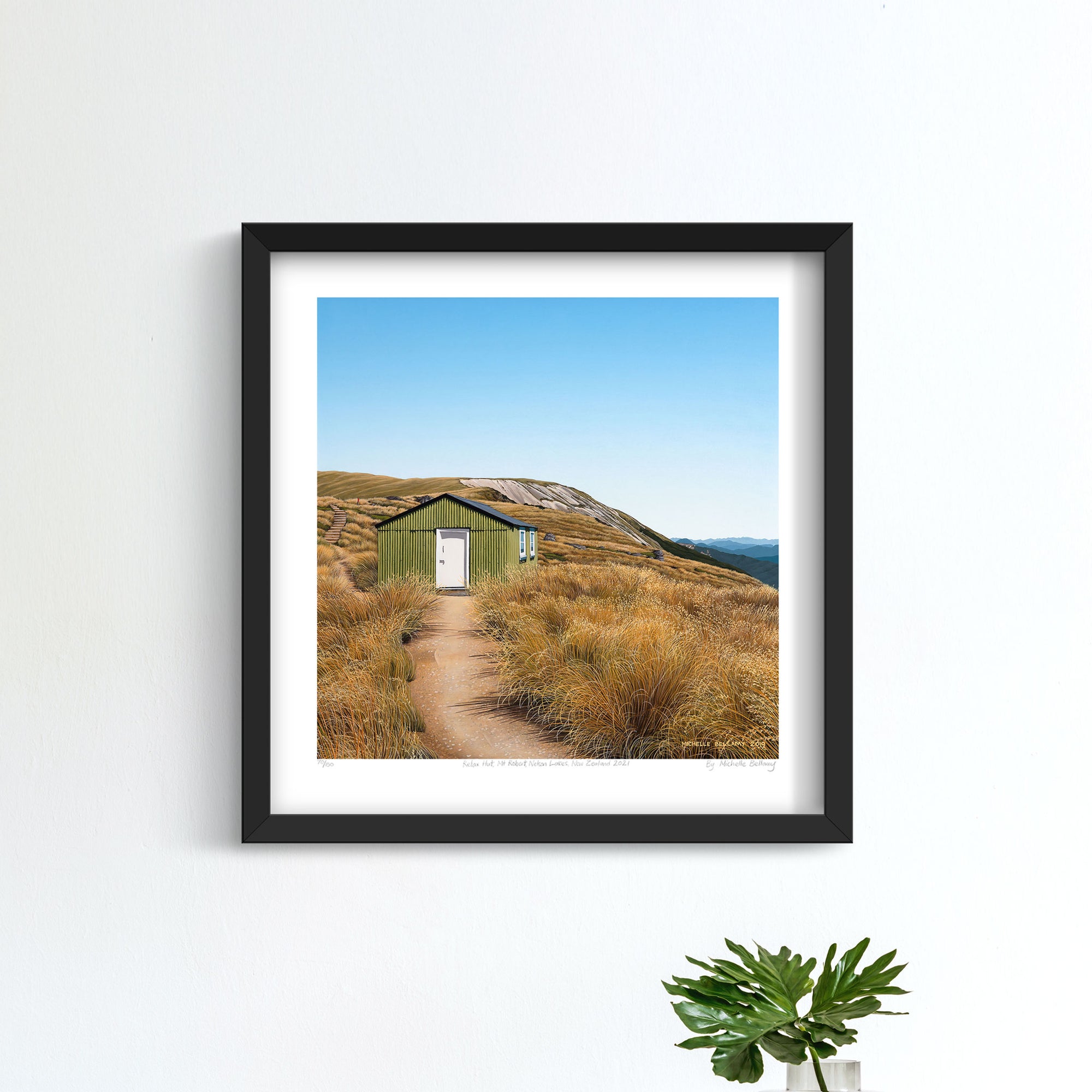 Framed art print of a relax hut on mt Robert with a clear blue sky.